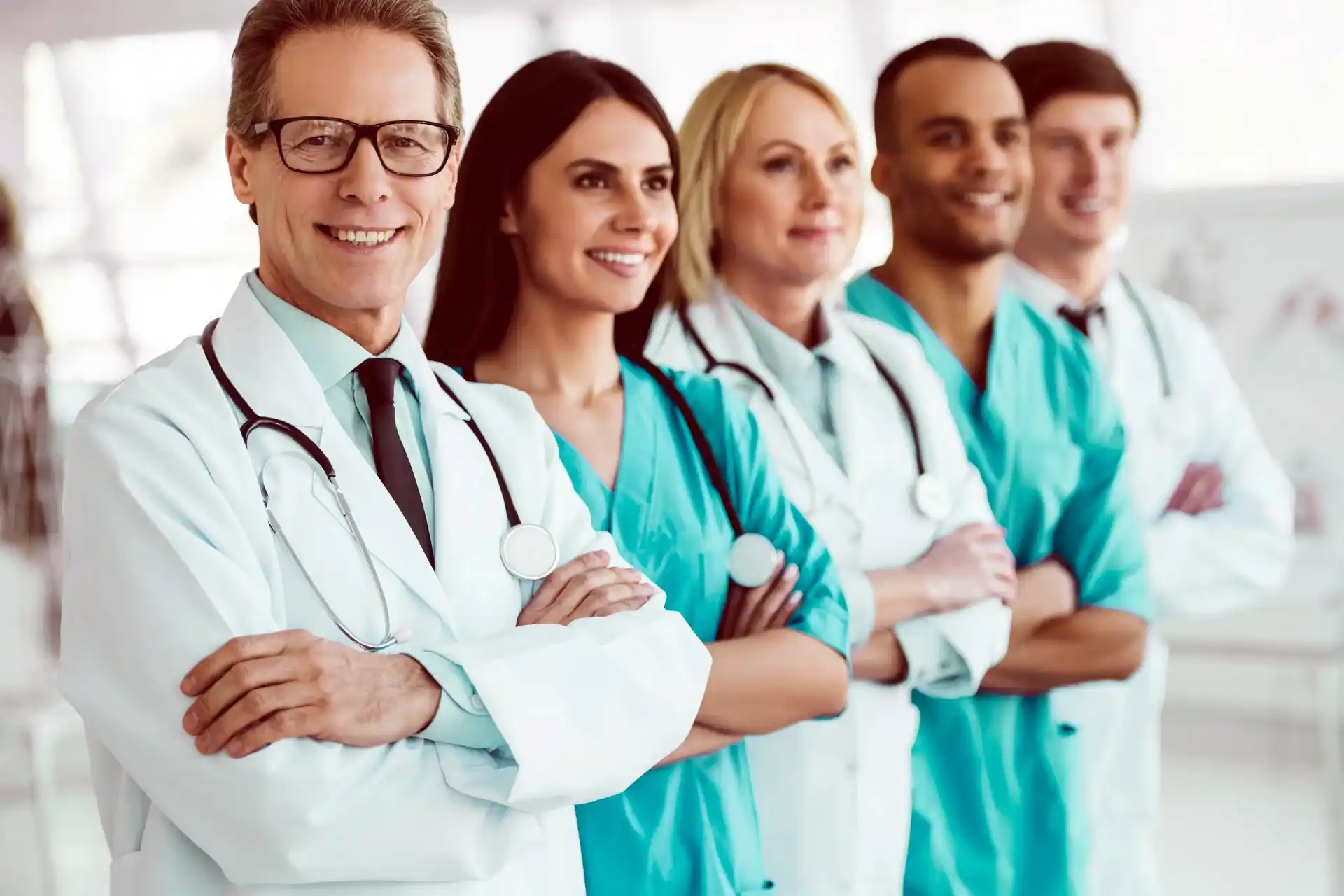 Five doctors of several disciplines in uniform